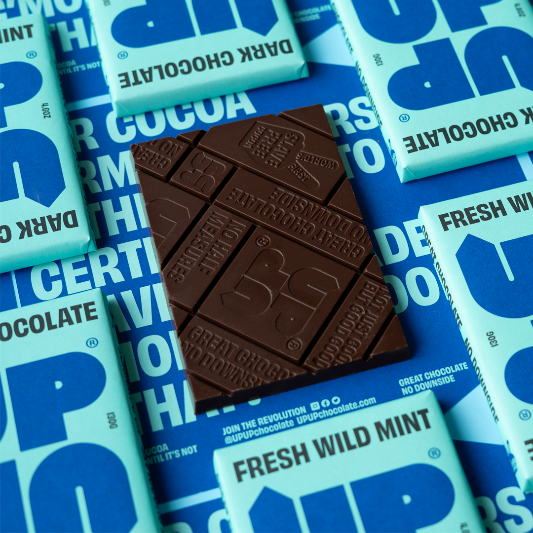 UP-UP Ethical Wild Mint Dark Chocolate Bar - showing the chocolate bar out of it&#39;s packaging showing design by penny black