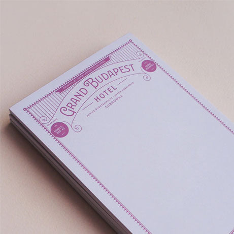 Grand Budapest Hotel Movie Notepad on a desk by penny black