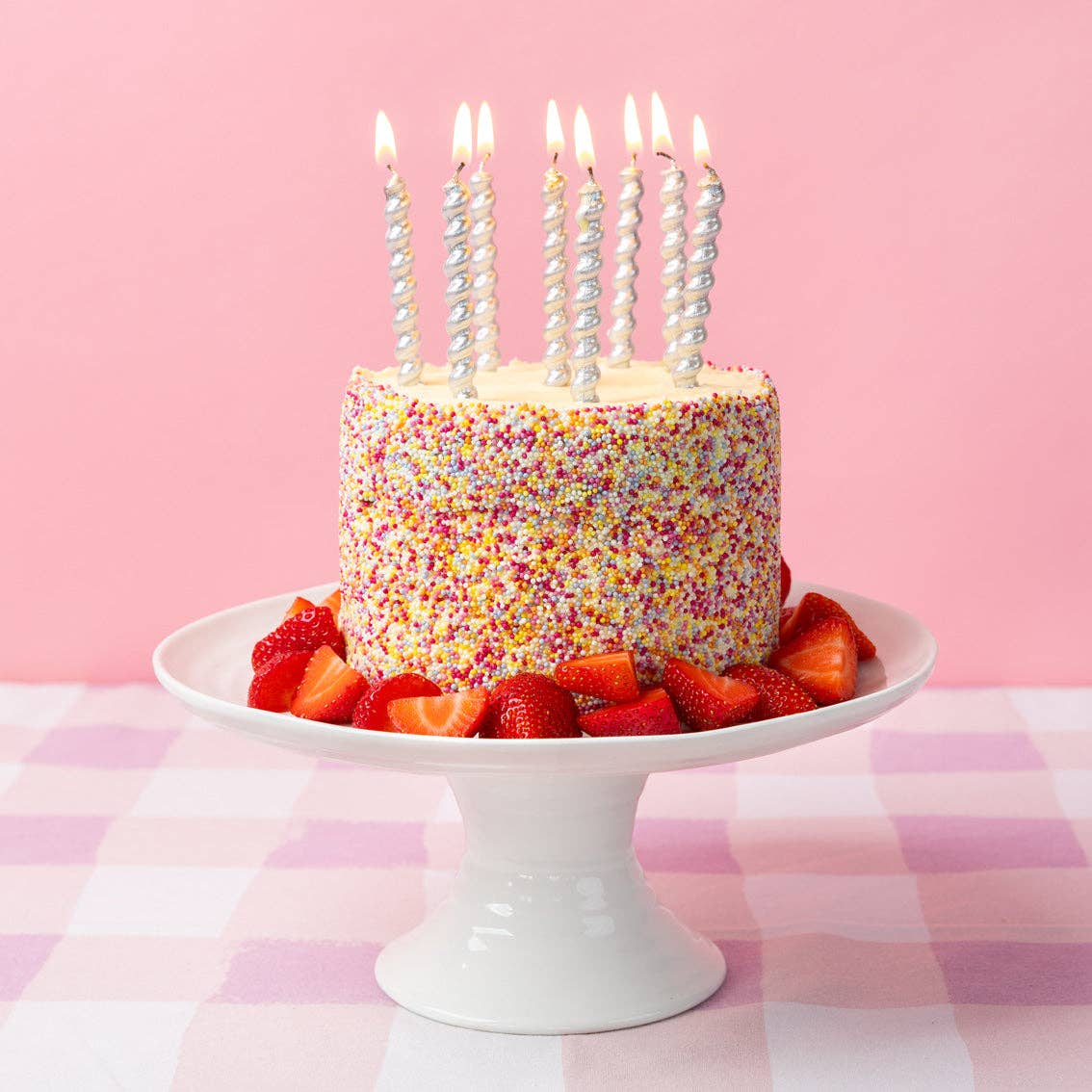 Silver Twirl Birthday Candles on a cake by penny black