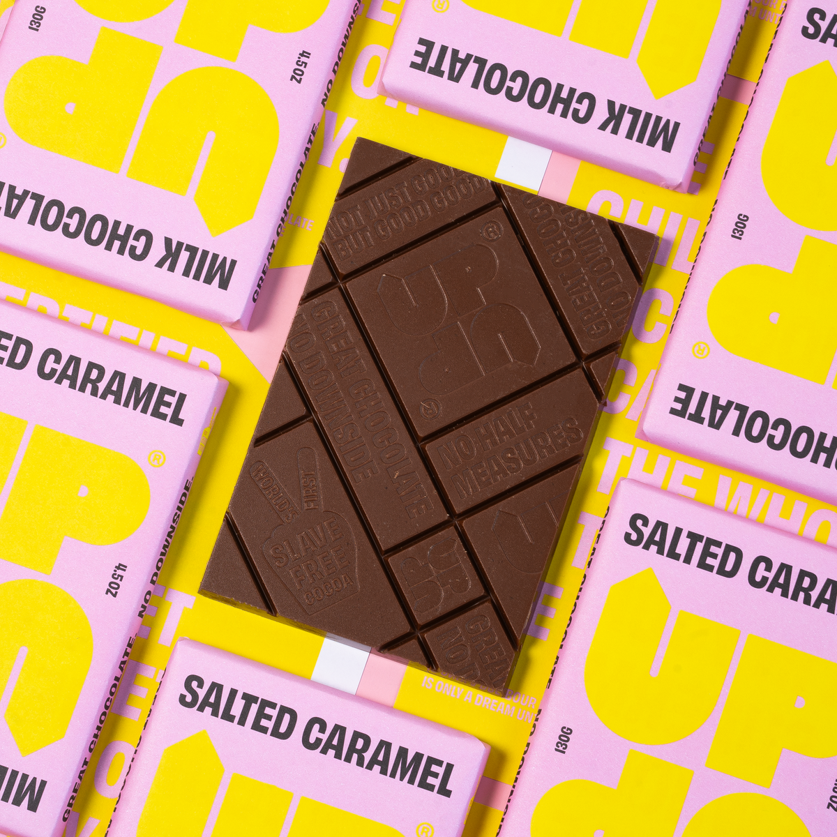 UP-UP Ethical Salted Caramel Milk Chocolate Bar - showing bar out of packaging highlighting chocolate design by penny black