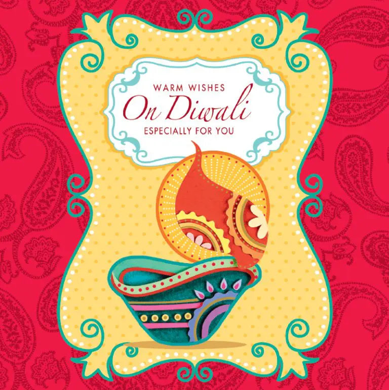 A Diwali greetings card featuring a candle flame and red paisley print. Words on the card read &#39;warm wishes on Diwali especially for you&#39;.