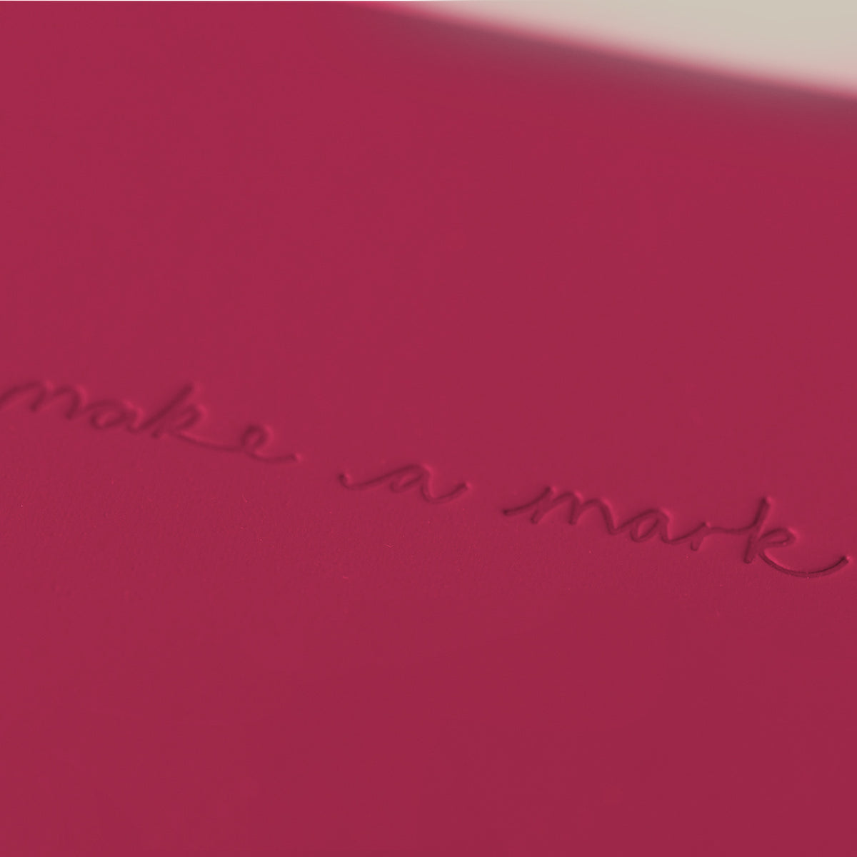 Make a Mark Recycled Leather A5 Lined Notebook in pink, close up