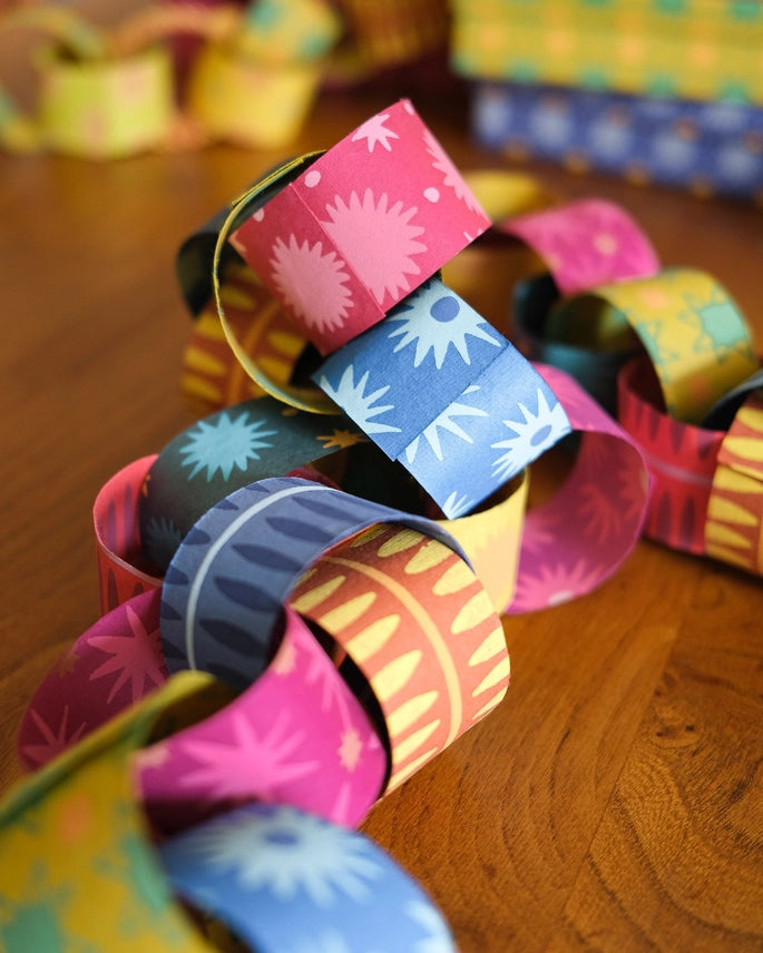 Festive Paper Chains Screen Printed Decorations - made up on the floor